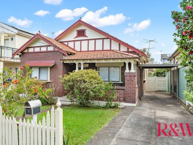 RENOVATED FAMILY HOME WITH CLASSIC CHARM!