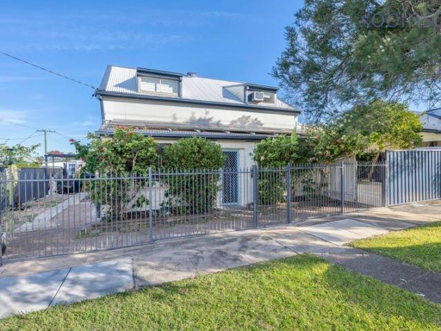 Renovated family home with double garage in prime location