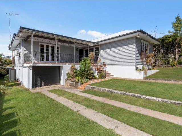 Renovated Family Home with Heated Pool, Entertaining Deck & City Views
