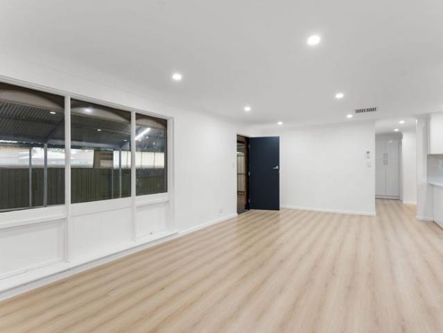 Renovated Family Home with Massive Secure Carport & Modern Comfort