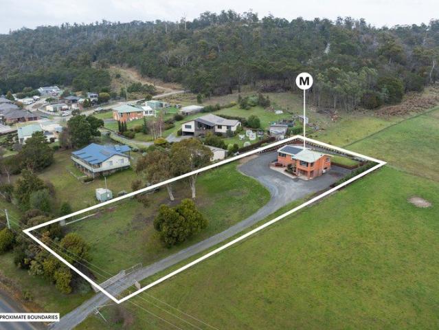 Renovated family home with peaceful farmland views on a private 2,909sqm block