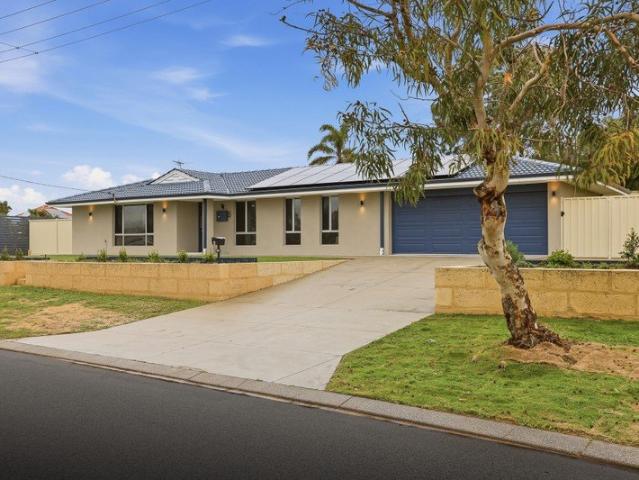 RENOVATED FAMILY HOME WITH SIDE ACCESS GATES, SWEEPING GARDENS AND A VAST CORNER SETTING