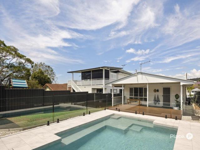 RENOVATED FAMILY LIVING & POOLSIDE ENTERTAINING IN CAMP HILL