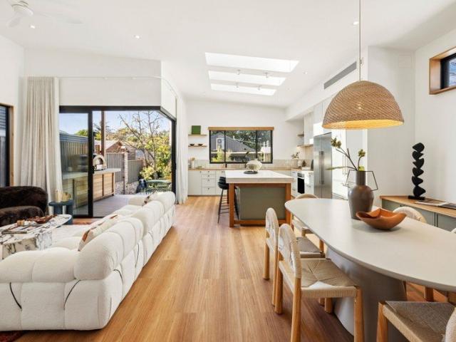 Renovated Freestanding Cottage with Expansive Interiors and Sun Washed Entertaining Spaces
