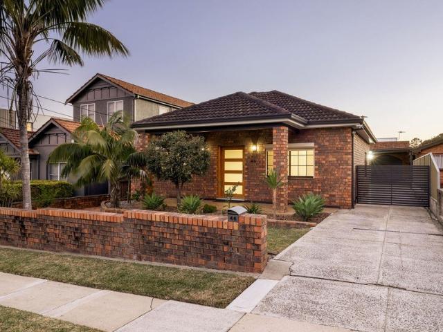 Renovated Full Brick, Single Level Home with a Huge Garage and a Large Block with Dual Street Access