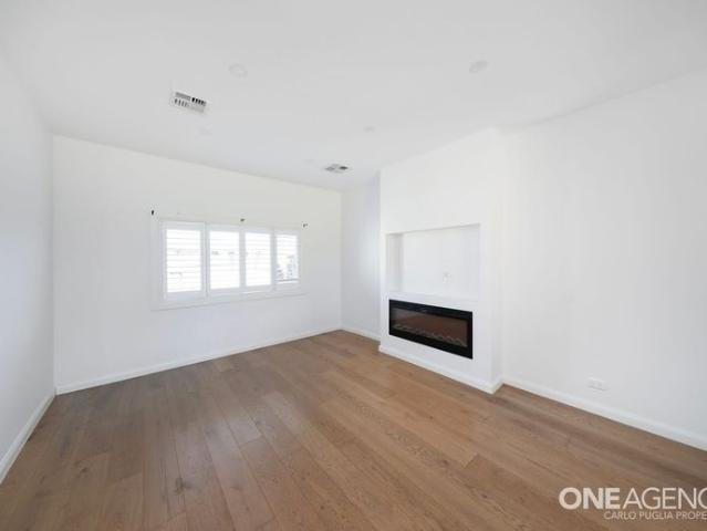 Renovated home with modern comforts including monthly lawn mow