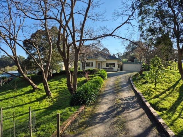 Renovated Home with Country Charm set on 3 Acres approx. of Clear Land
