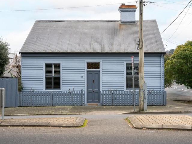 Renovated home with gorgeous character, secure garaging, hidden backyard as it's sanctury