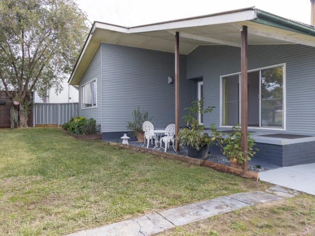 Renovated home with huge shed