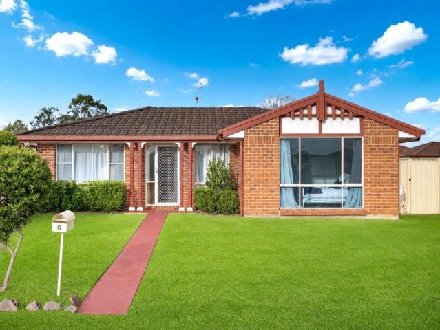 RENOVATED HOME WITH HUGE SIDE ACCESS AND YARD!