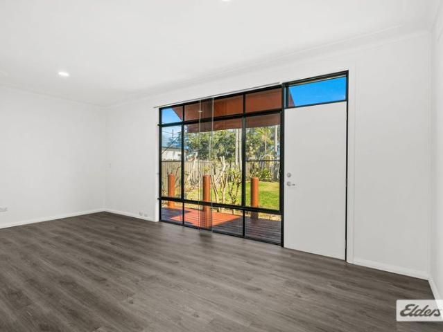 Renovated Home with 4 Car Garage + separate teenagers retreat