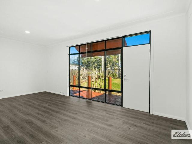 Renovated Home with 4 Car Garage + separate teenagers retreat