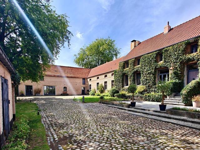 Renovated historic farm with a view of the Lion