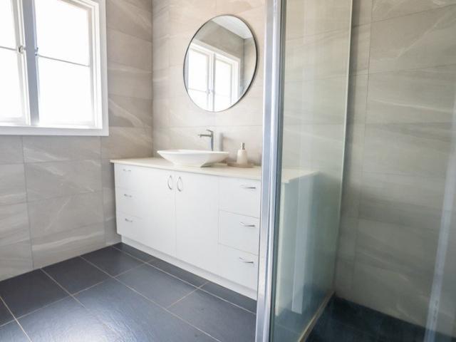 Renovated Inside, Massive Block Outside Endless Potential!