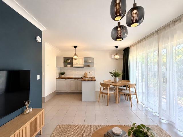 Renovated One Bedroom Gem with Private Courtyard, Pool & Broadwater Lifestyle