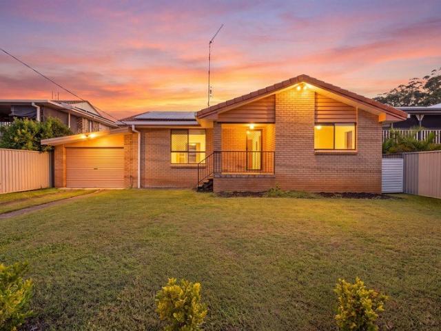 Renovated, Low Maintenance Living with Solar & Sunroom