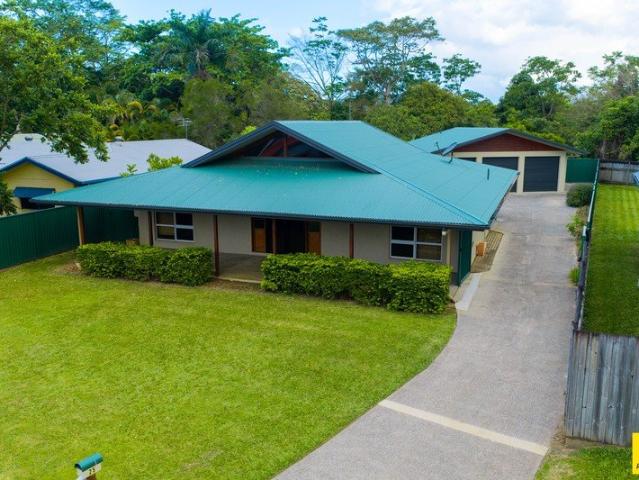 Renovated lowset home with a powered shed, wide side access and room to move