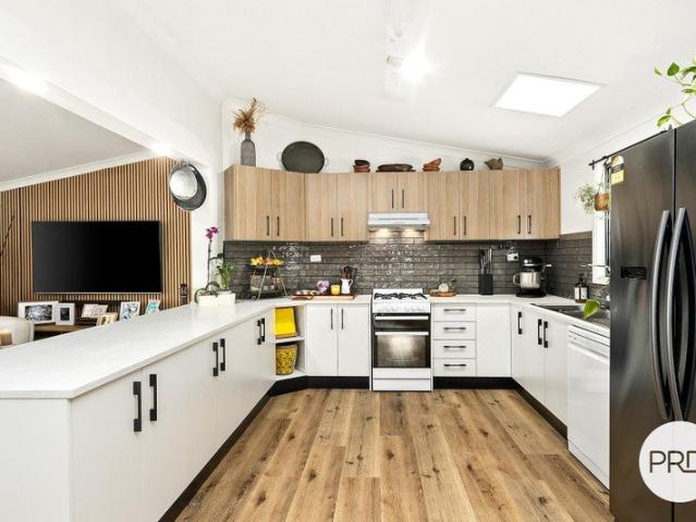 Renovated Lakeside Lifestyle in an Exclusive Over 50's Community