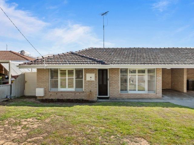 Renovated Living with a Generous Yard Opposite Macfaull Park