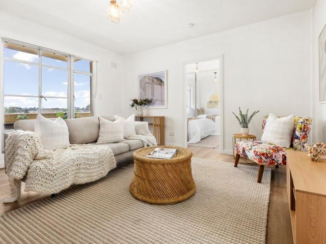 Renovated, Light Filled Apartment with Rooftop Views