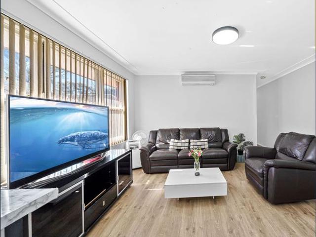Renovated, north facing, top floor 2 bedroom unit located at Wiley Park