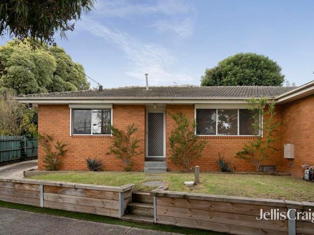 Renovated single level living in a prized walkable location