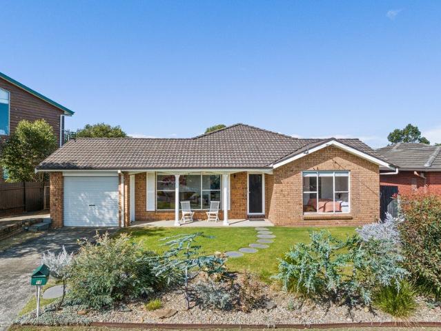Renovated single level living in a whisper quiet beachside enclave