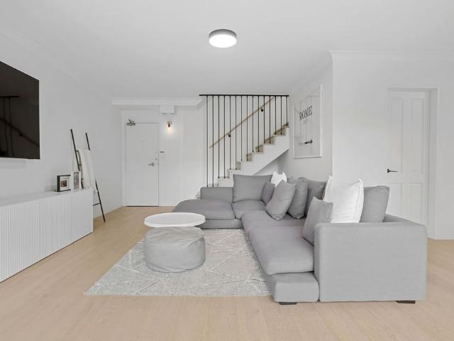 Renovated Split Level Townhouse With Parking!