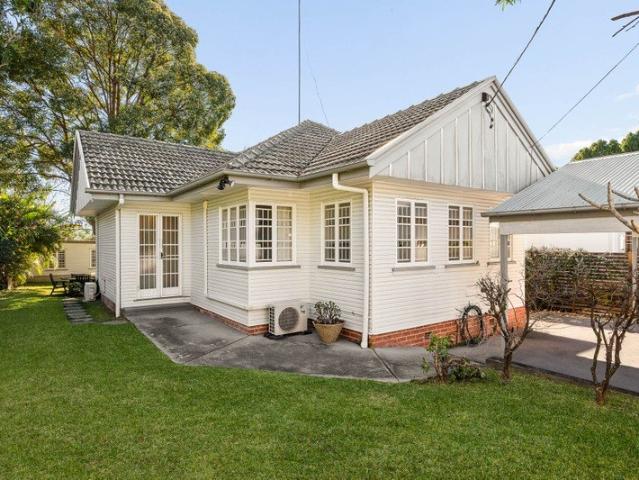 Renovated Post War Home with Outstanding Future Potential