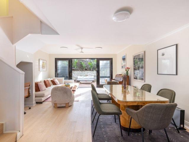 Renovated peninsula terrace with harbour glimpses