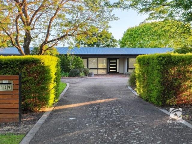 RENOVATED PERFECTION WITH EXCEPTIONAL OUTSIDE ENTERTAINING