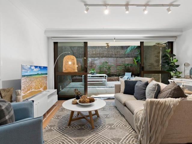 RENOVATED, PRIVATE NORTH FACING TOWNHOUSE