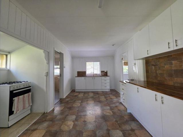 Renovated Queenslander on a Spacious Block with Pool & Huge 3 Bay Shed