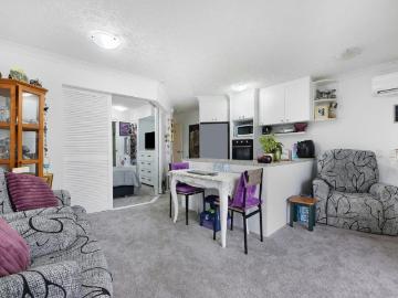 RENOVATED RESORT LIVING WITH BROADWATER VIEWS