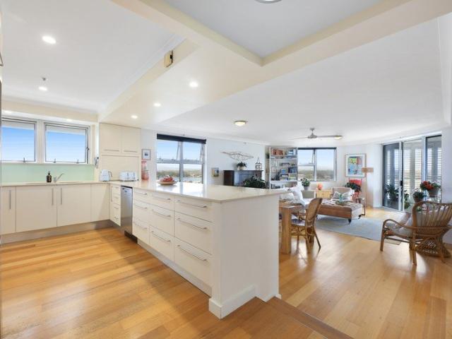 Renovated Riverfront Living in Prestigious Paradise Waters