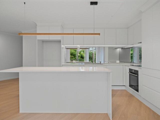 Renovated Riverside Living with City Views