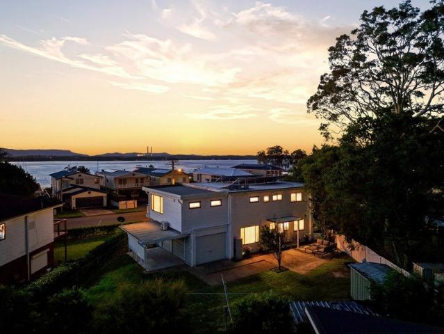 Renovated. Waterside. Ready for the Life You've Been Designing in Your Head