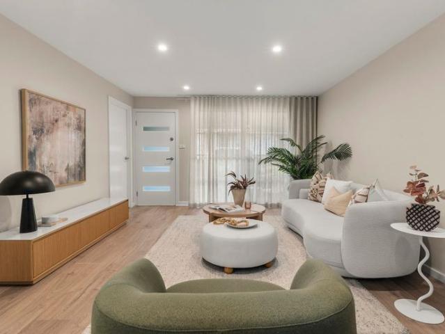 Renovated Townhouse Offering Space, Style & Convenience