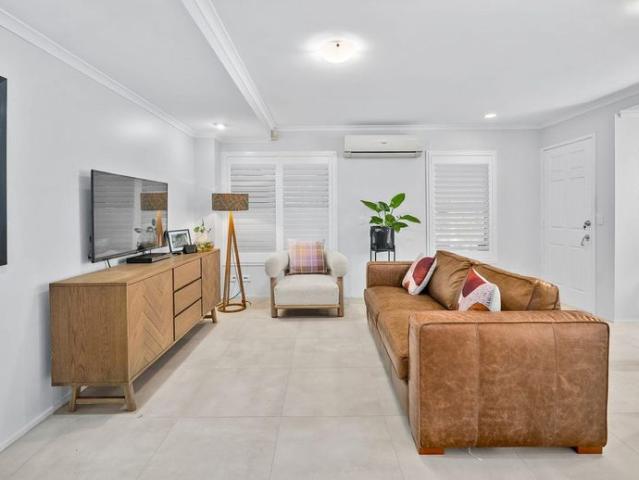 Renovated Townhouse Offering Space, Style & Exceptional Convenience