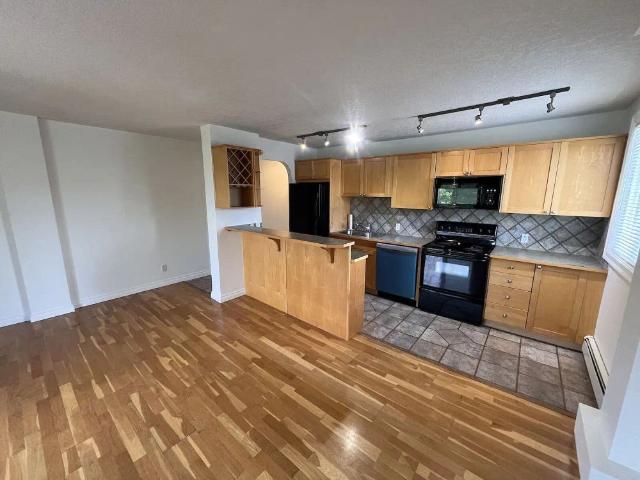 Renovated Top Floor Penthouse, Corner Unit, 2 BED 1 Bath — 2 Bedrooms Condo Unit