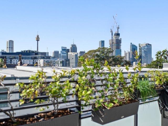 Renovated Top Floor Retreat with Cityscape Views