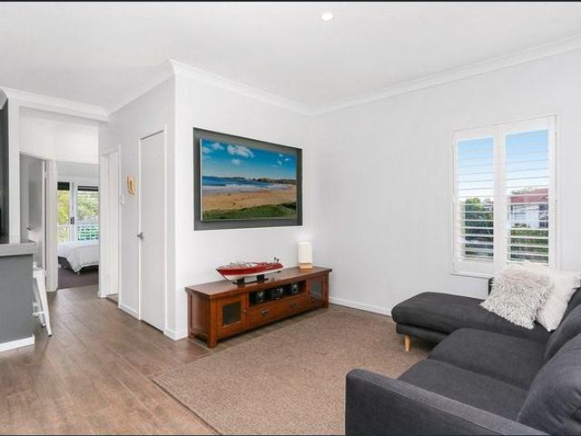 Renovated Top Floor Unfurnished Apartment Walk to The Beach!