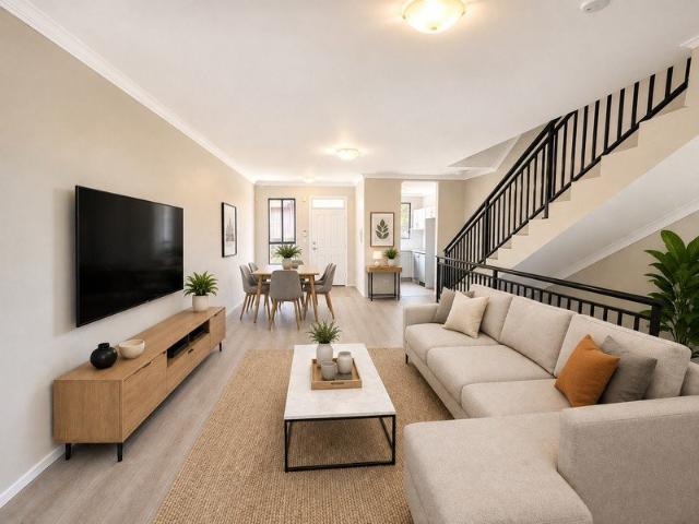 Renovated Three Bedroom Townhouse !