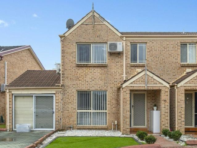 RENOVATED THREE BEDROOM TOWNHOUSE IN QUIET LOCALE