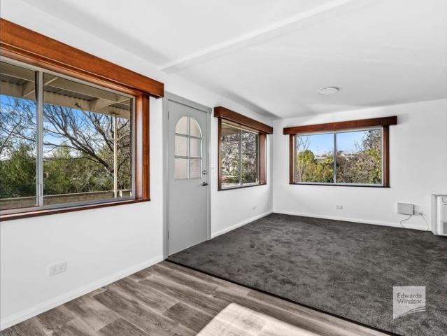 Renovated Three Bedroom Gem in Convenient New Town Location