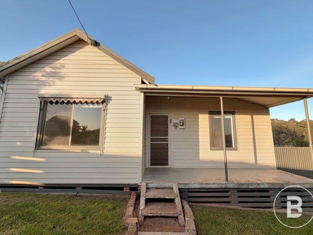 Renovated Three Bedroom Home Offering Comfort and Convenience