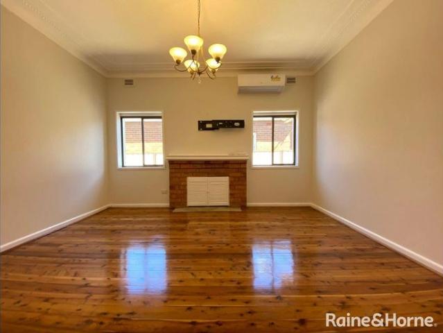 RENOVATED THREE BEDROOM HOUSE WITH SUNNY YARD