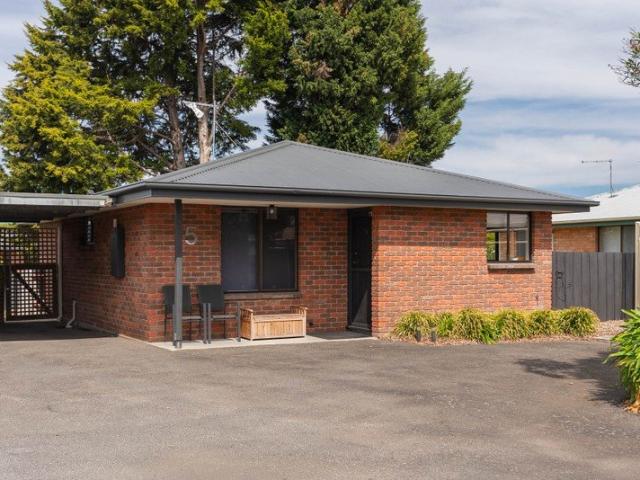 Renovated throughout, open plan living areas with a private courtyard backing onto the reseverve