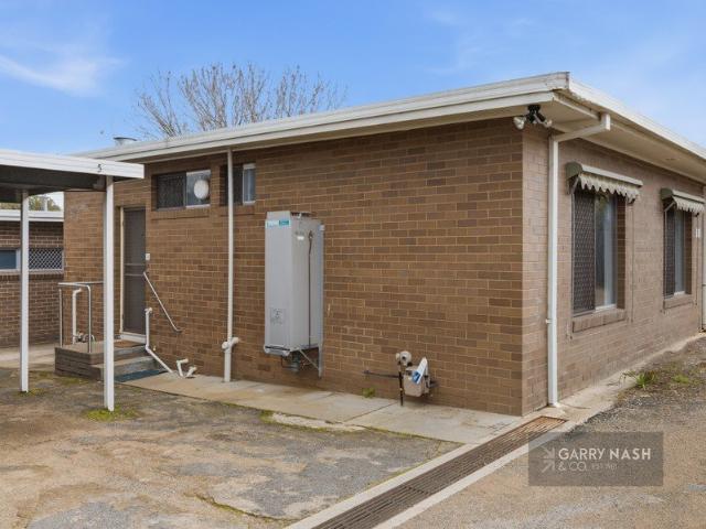 RENOVATED UNIT IN A PRIVATE CENTRAL SETTING