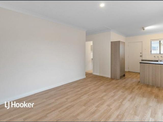 RENOVATED UNIT JUST A SHORT STROLL TO THE BEACH!